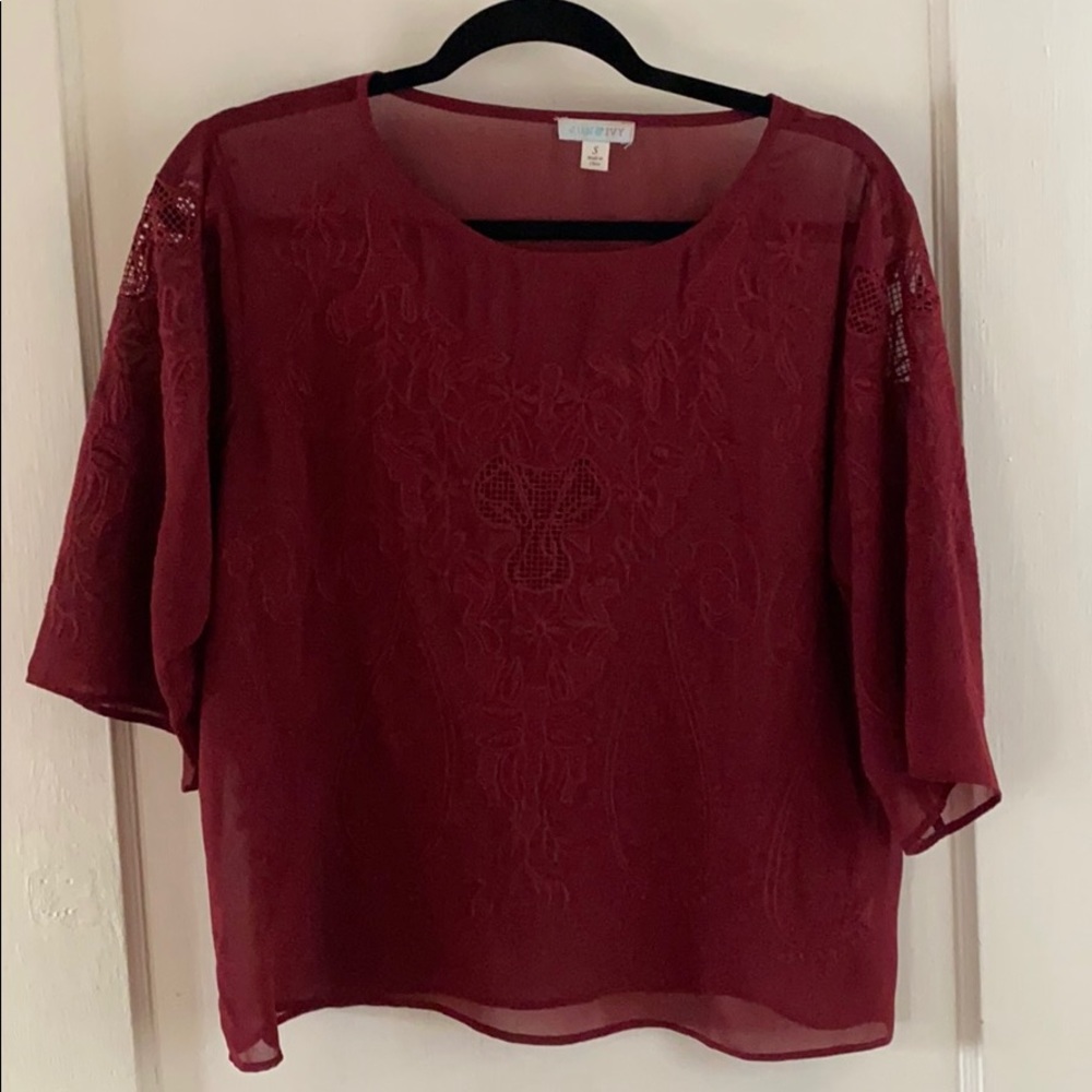 Francesca’s burgundy top